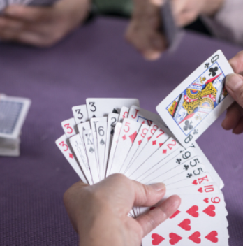 A person is holding a card