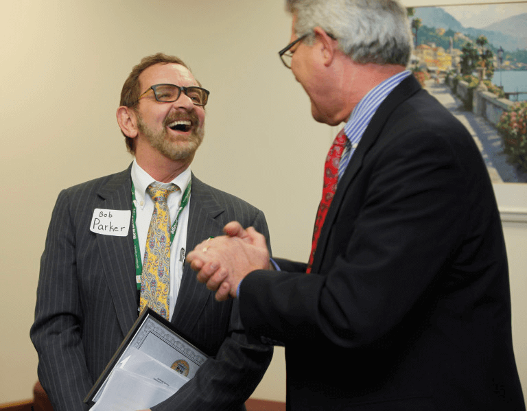 NewBridge CEO Robert Parker welcomes local business leaders